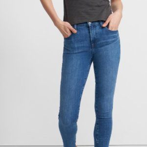 Black J Brand Maria high-rise jean features a super-skinny leg
